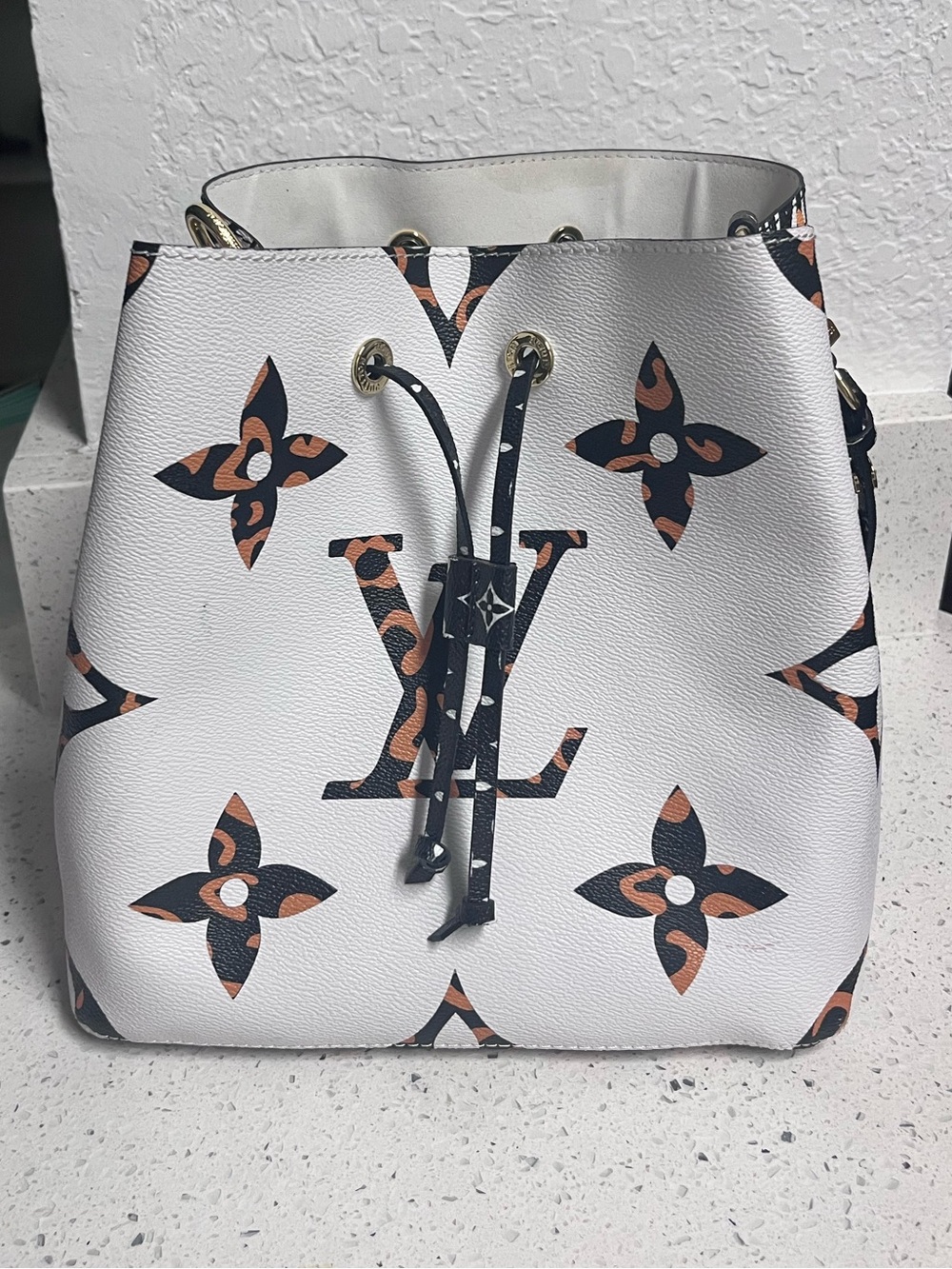 Animal print bucket bag